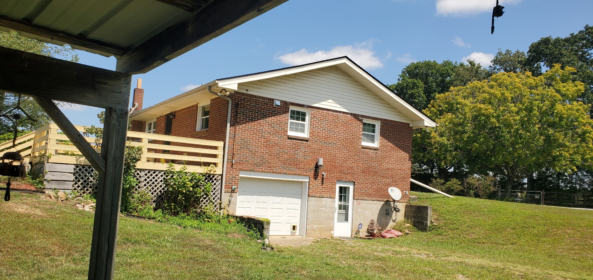 7690 Barnhill Road Primm Springs, TN 38476 - Photo 6 of 50 a view of a house with a yard