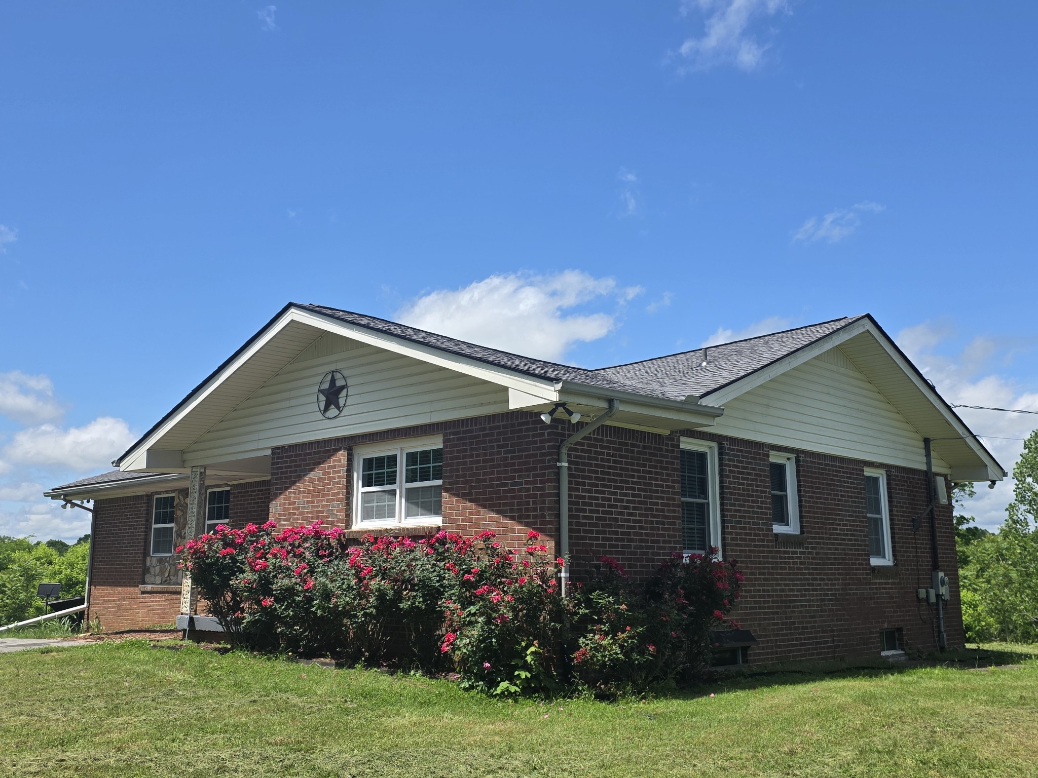 7690 Barnhill Road Primm Springs, TN 38476 - Photo 7 of 50 a front view of house with yard and green space