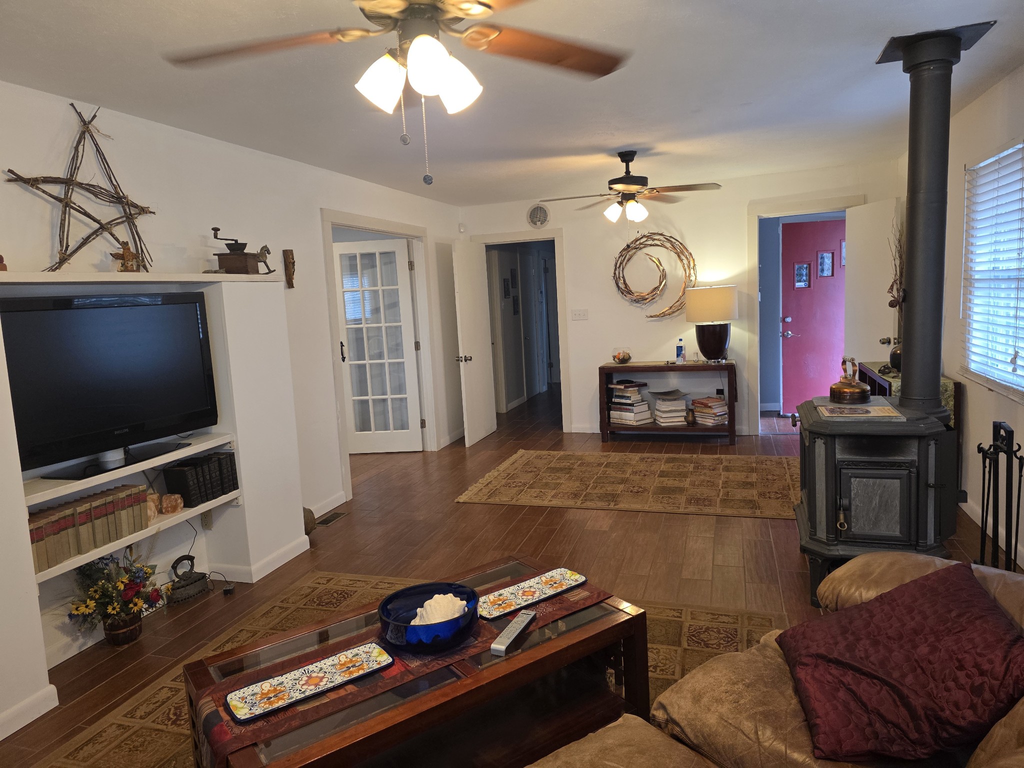 7690 Barnhill Road Primm Springs, TN 38476 - Photo 10 of 50 a living room with furniture and a flat screen tv