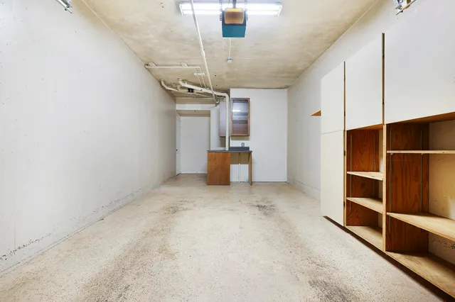 a view of empty room with stairs