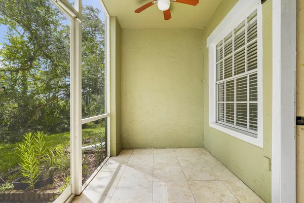 a view of empty room with windows