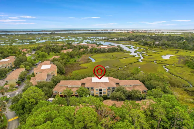 a view of an ocean and city