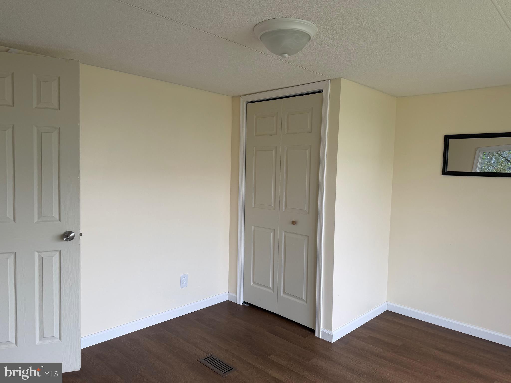 1104 West Elm Avenue Hanover, PA 17331 - Photo 9 of 13 a view of an empty room with wooden floor