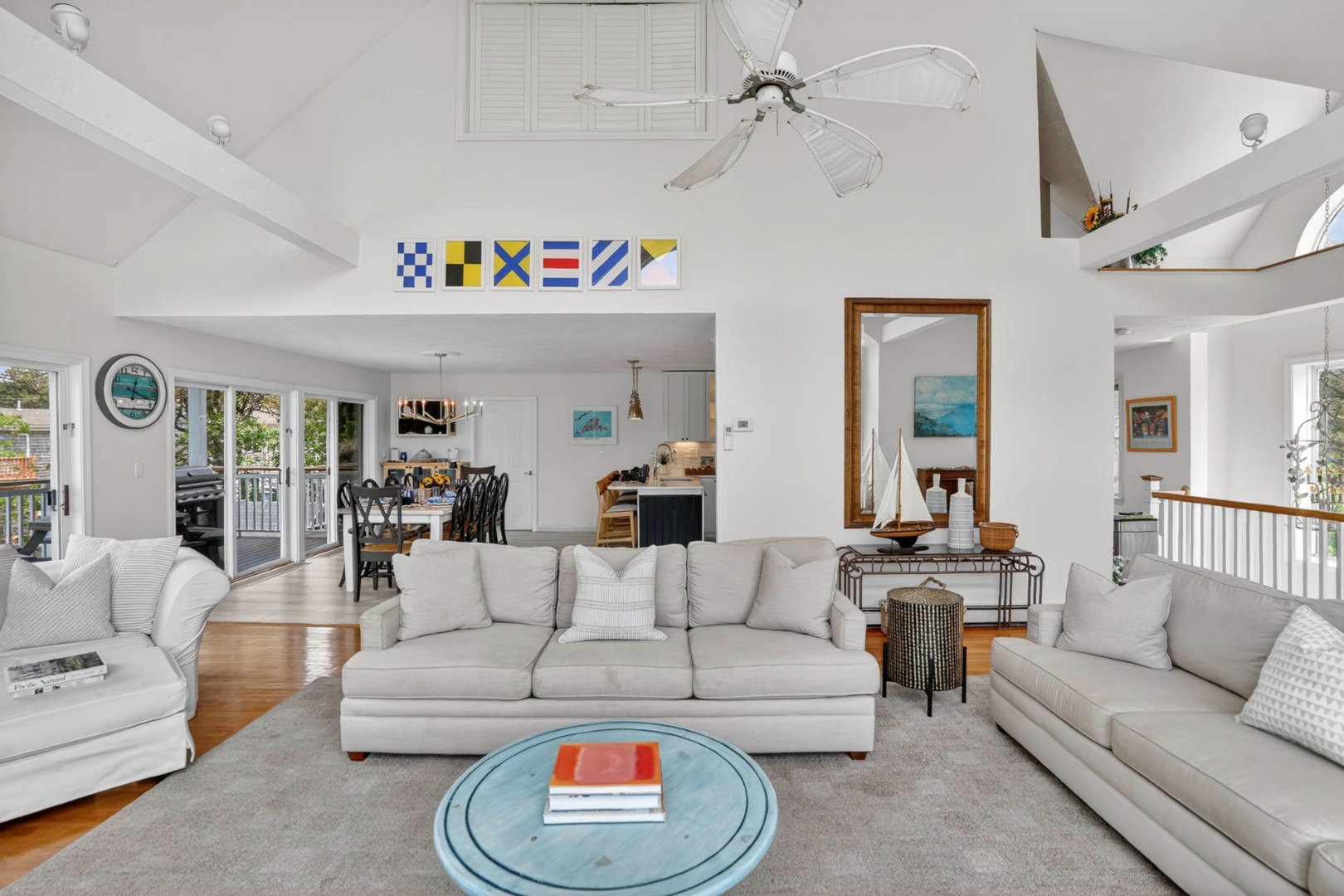 9 Thaxter Lane Edgartown, MA 02539 - Photo 8 of 53 a living room with furniture and a table