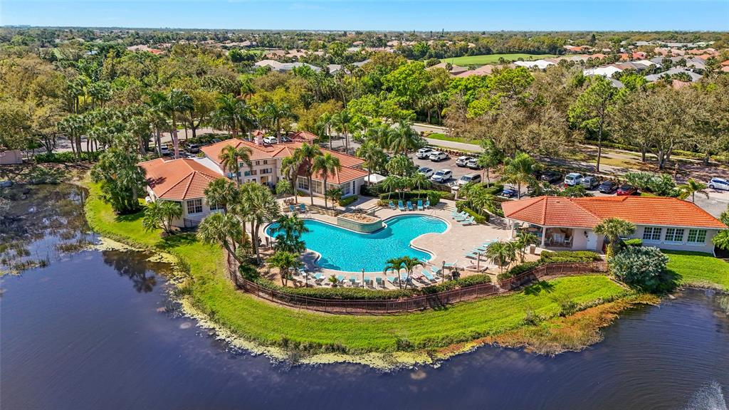 357 Marsh Creek Road Venice, FL 34292 - Photo 54 of 70 an aerial view of a house with a swimming pool yard and outdoor seating