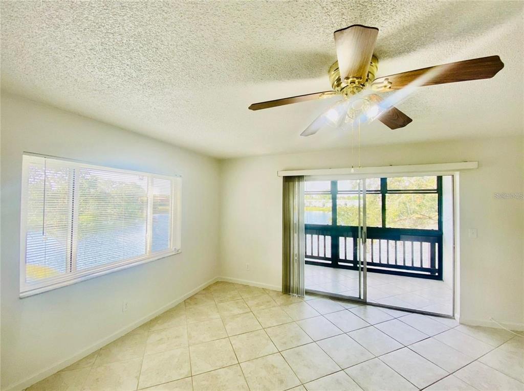 633 North Keene Road, Unit C Clearwater, FL 33755 - Photo 7 of 20 a view of an empty room with window