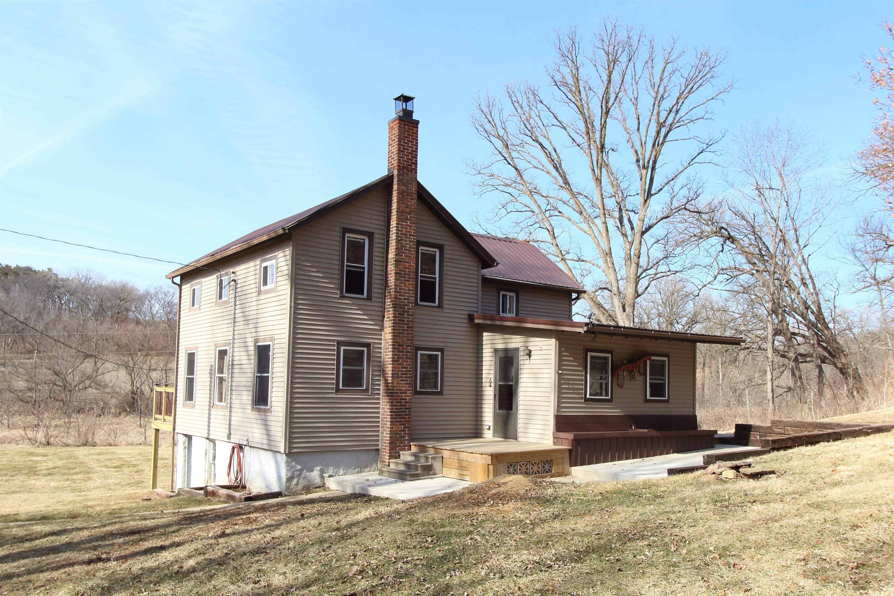 17896 Skunk Hollow Road Mount Carroll, IL 61053 - Photo 29 of 36 a front view of a house with a yard