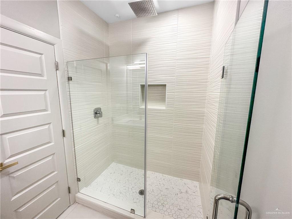 2002 East 1st Street, Unit 2 Mission, TX 78572 - Photo 11 of 15 Bathroom with a shower stall