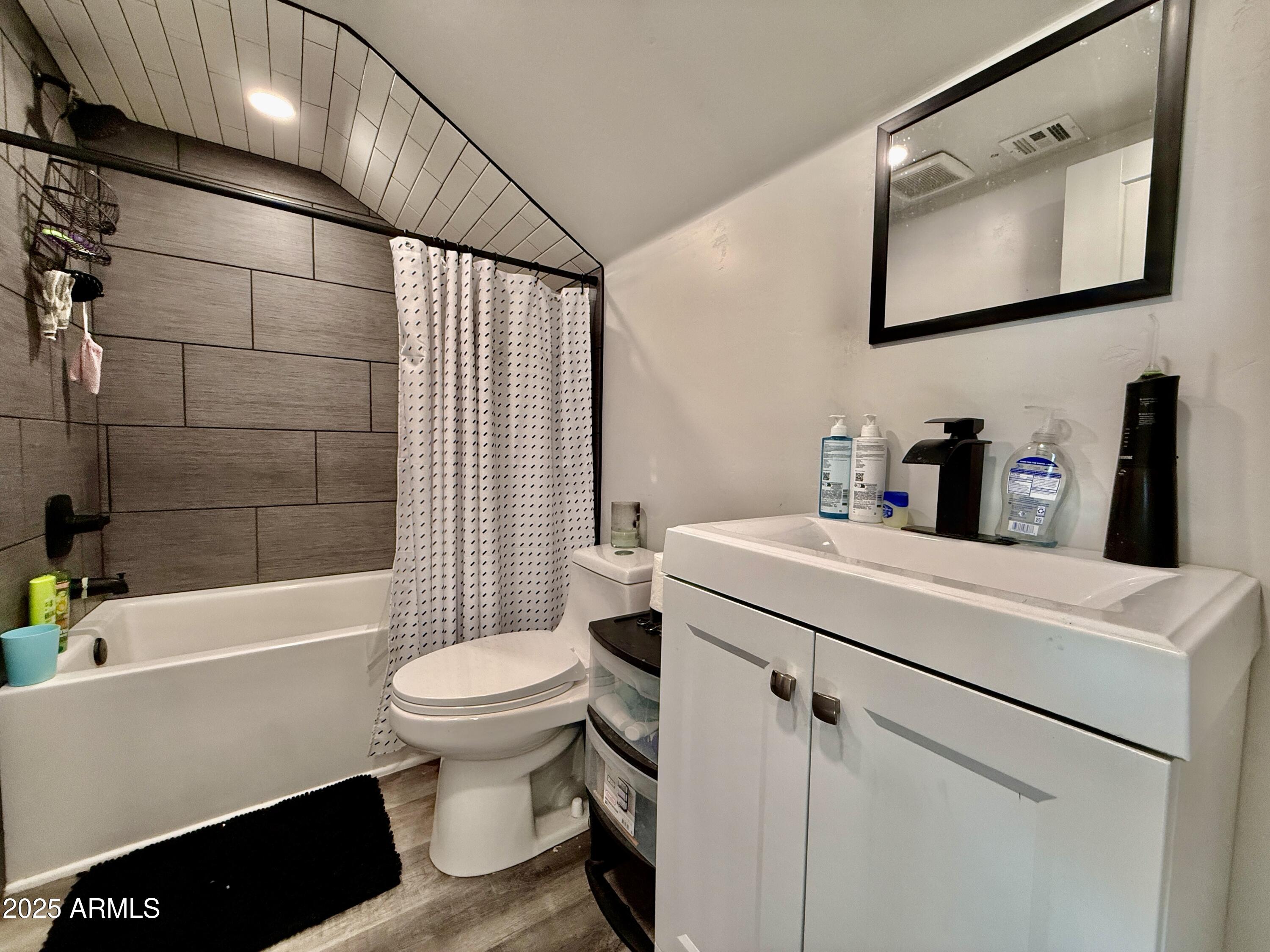 640 South 600 West Pima, AZ 85543 - Photo 17 of 22 a bathroom with a sink a toilet and shower