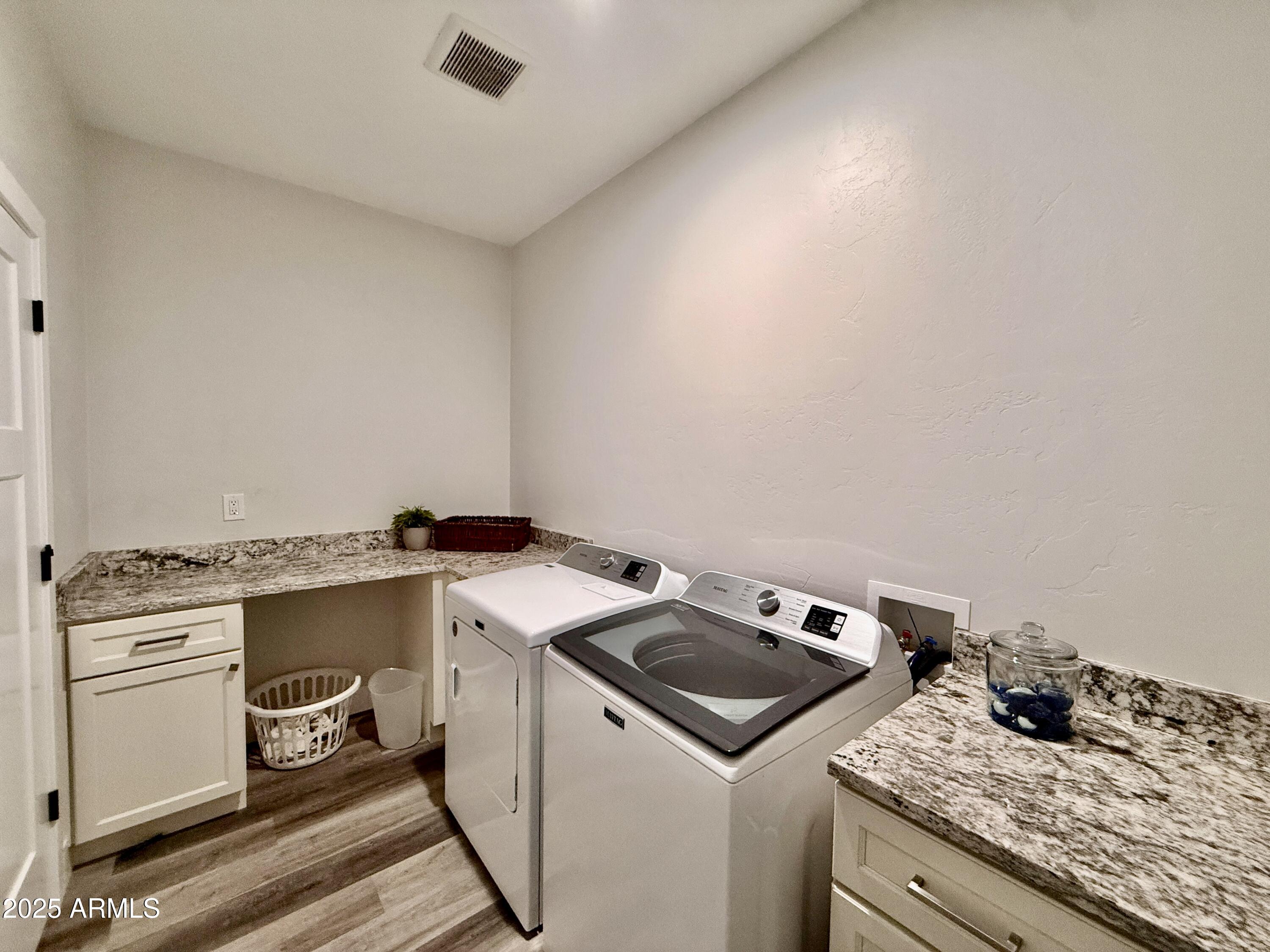 640 South 600 West Pima, AZ 85543 - Photo 7 of 22 a utility room with dryer and washer