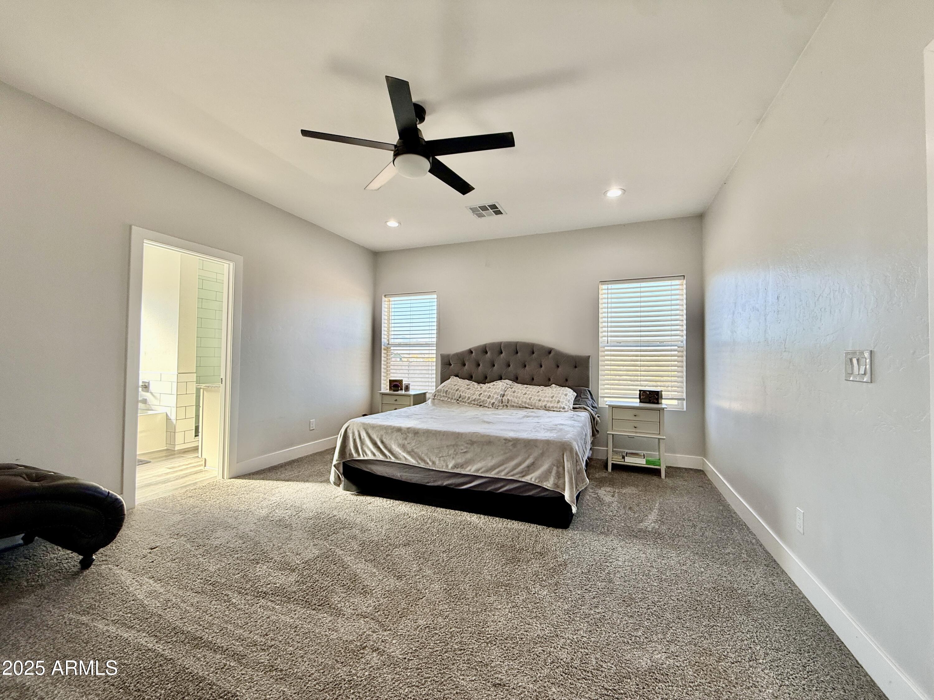 640 South 600 West Pima, AZ 85543 - Photo 8 of 22 a bedroom with a bed chandelier and a window