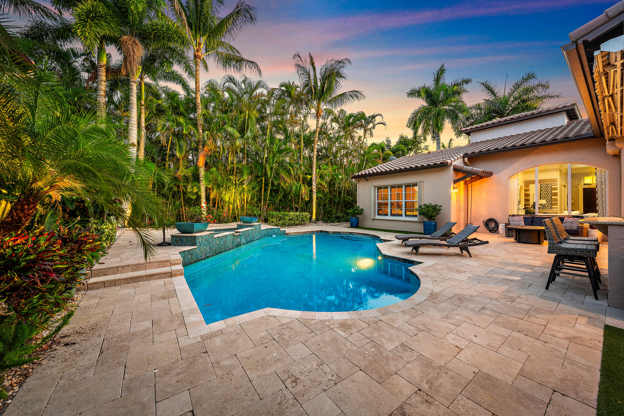 105 Segovia Way Jupiter, FL 33458 - Photo 2 of 33 a view of a backyard with a patio