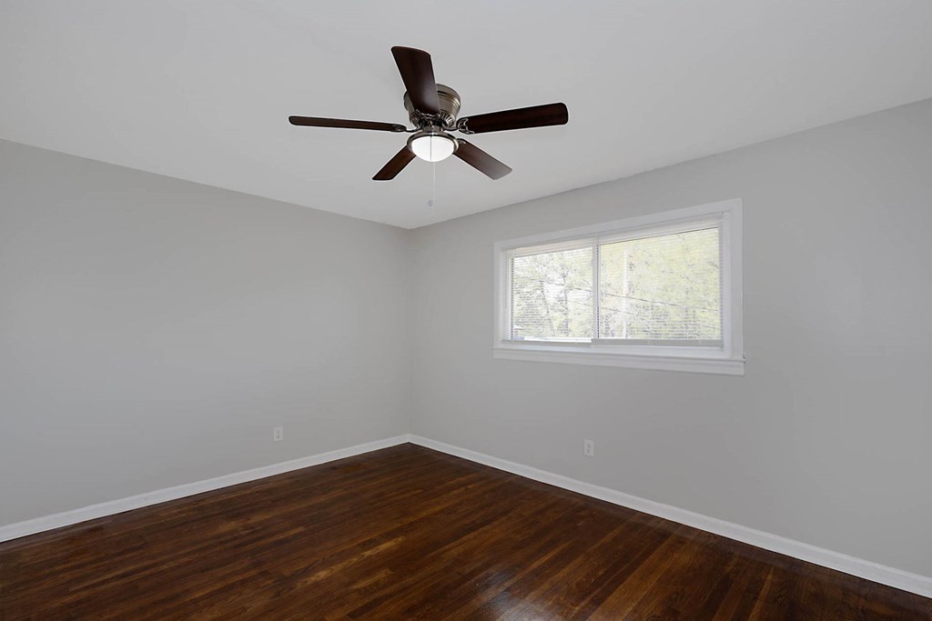 4270 Athens Court Columbus, GA 31907 - Photo 17 of 32 a view of empty room with wooden floor and window