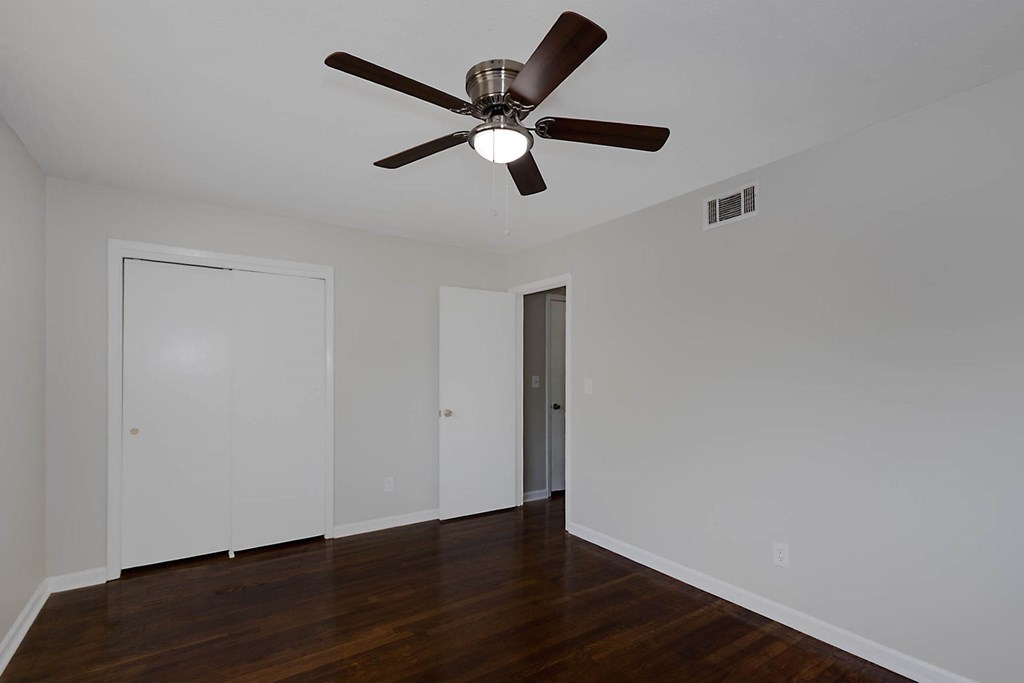 4270 Athens Court Columbus, GA 31907 - Photo 19 of 32 a view of an empty room with wooden floor