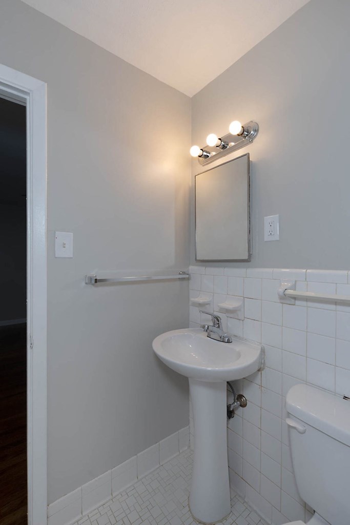 4270 Athens Court Columbus, GA 31907 - Photo 24 of 32 a bathroom with a sink a toilet and mirror