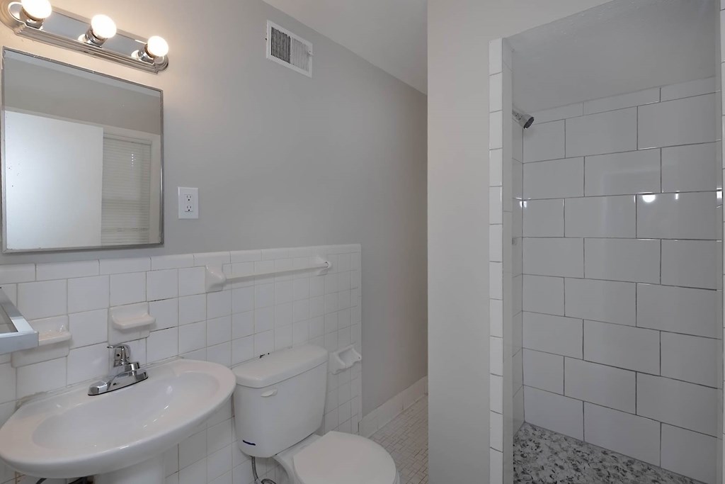 4270 Athens Court Columbus, GA 31907 - Photo 25 of 32 a bathroom with a sink mirror and toilet