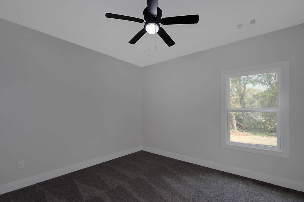 4270 Athens Court Columbus, GA 31907 - Photo 29 of 32 an empty room with a window and a fan