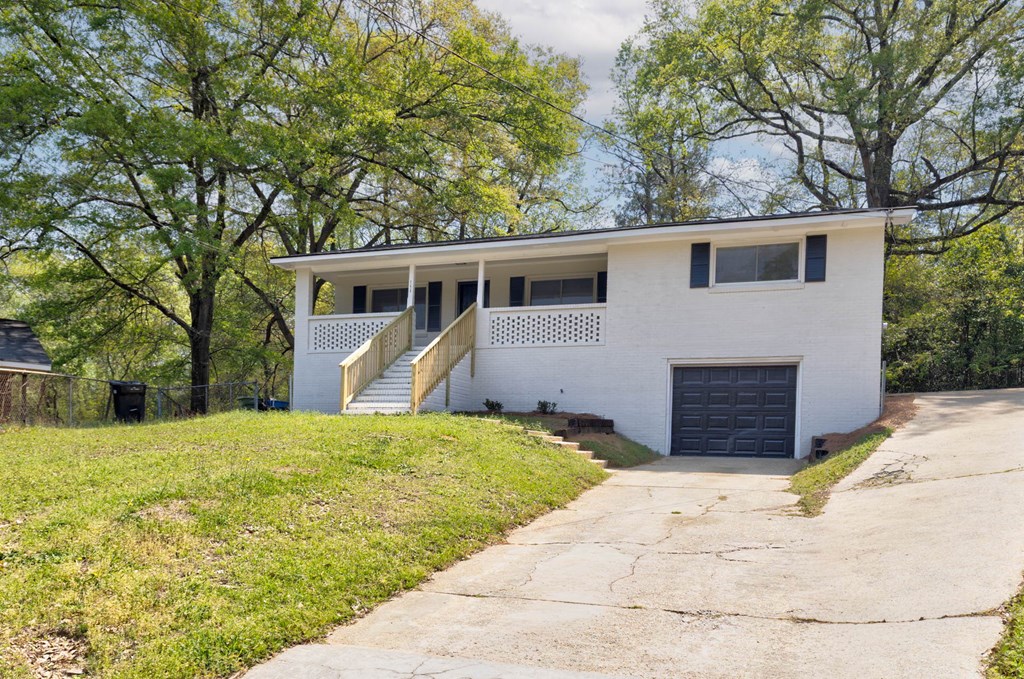 4270 Athens Court Columbus, GA 31907 - Photo 5 of 32 a front view of house with yard and trees in the background