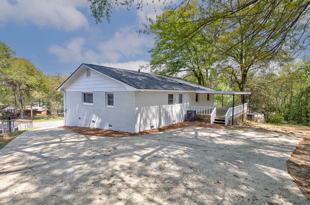 4270 Athens Court Columbus, GA 31907 - Photo 6 of 32 a view of a house with a yard and large tree