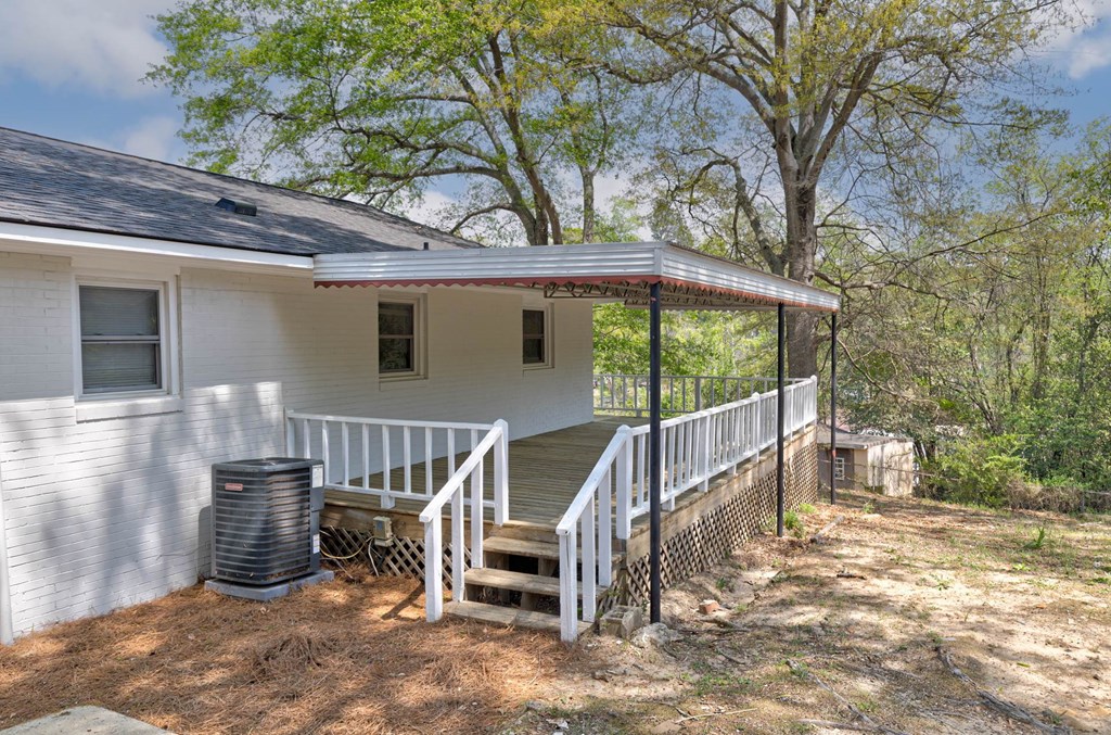 4270 Athens Court Columbus, GA 31907 - Photo 7 of 32 a view of a chair and table in backyard of the house