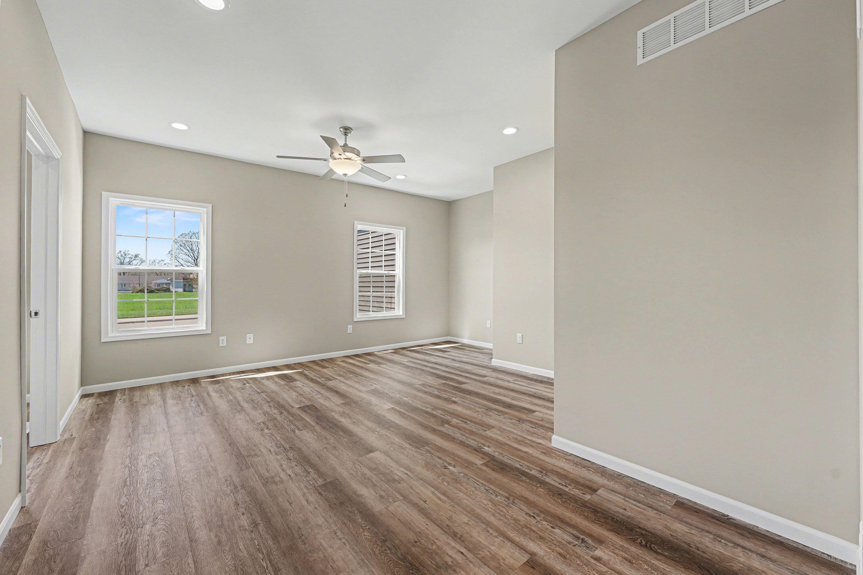 6065 Robbins Road Portage, IN 46368 - Photo 8 of 15 wooden floor in an empty room with a window