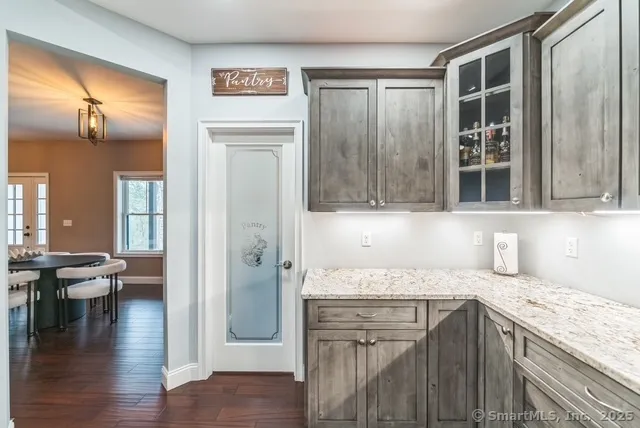 a room with book shelf and book shelf