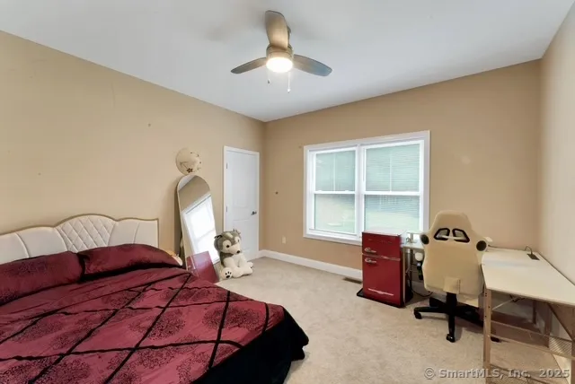 a view of room with gym equipment