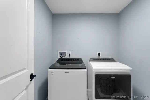 a view of a room with wooden ceiling