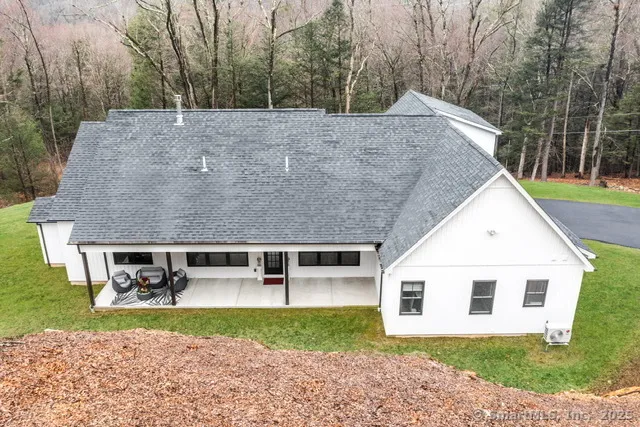 a house view with a garden space