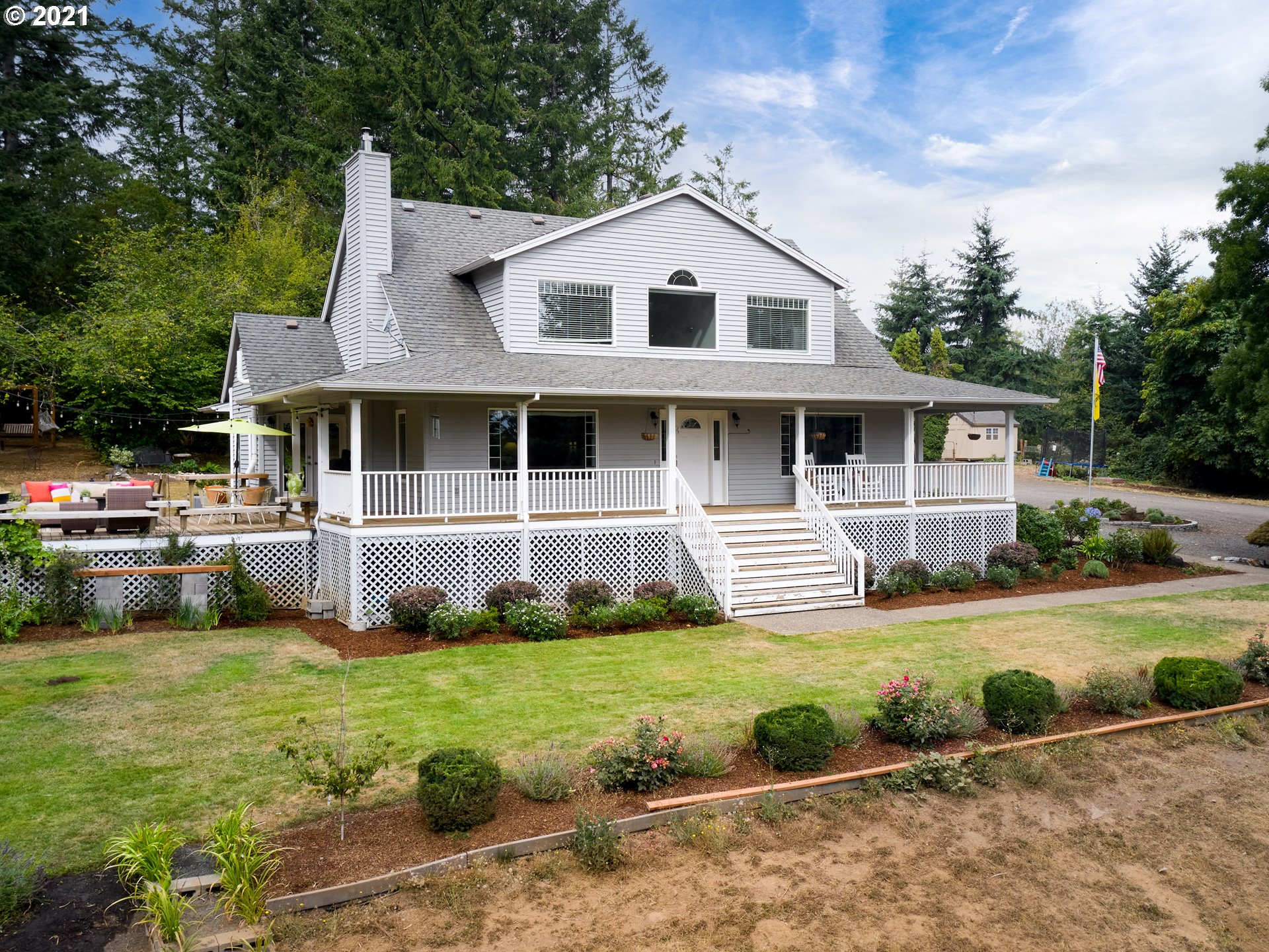 24355 Southwest Melott Road Hillsboro, OR 97123 - Photo 4 of 32 a view of a yard in front of house