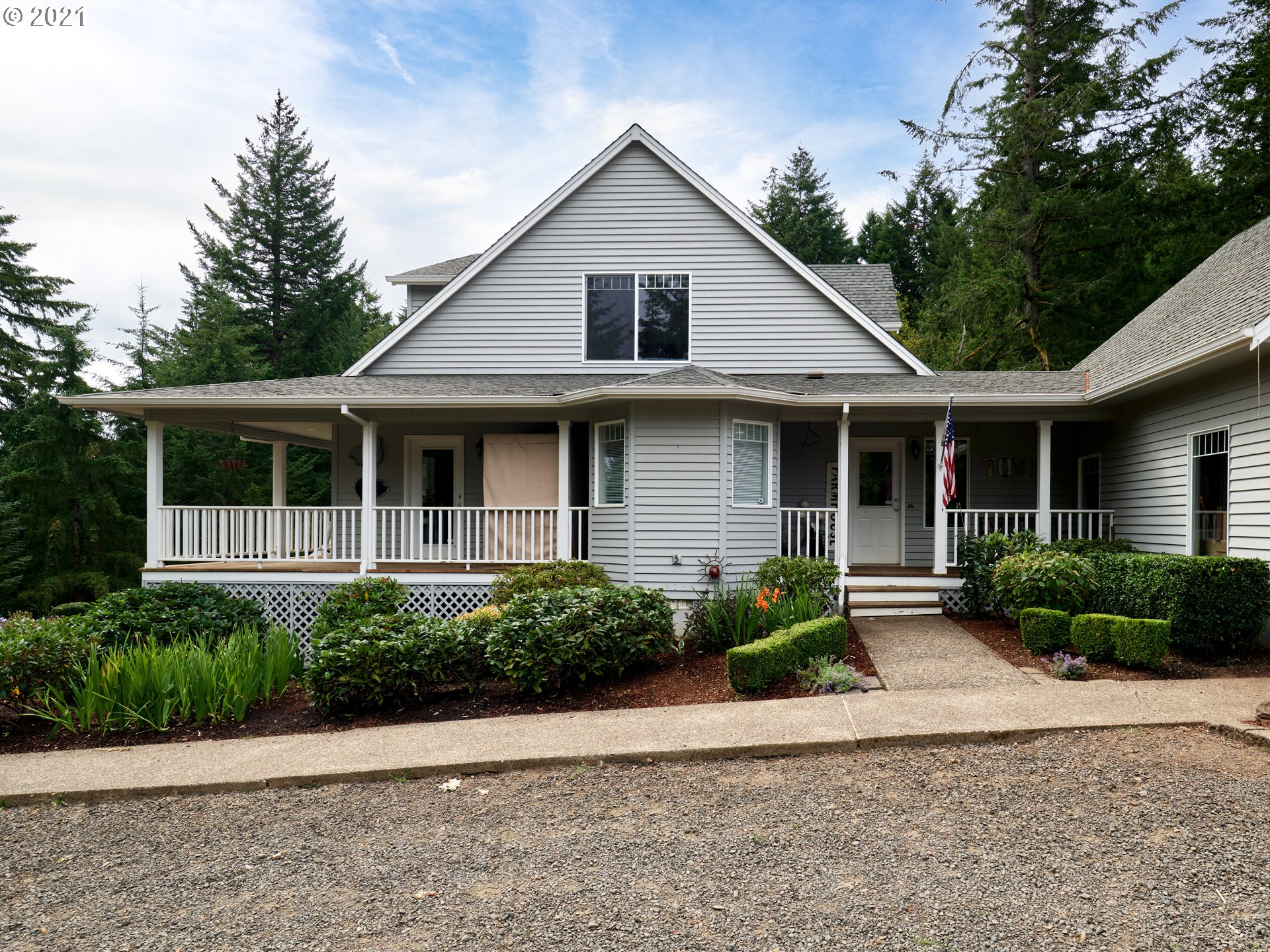 24355 Southwest Melott Road Hillsboro, OR 97123 - Photo 7 of 32 a front view of a house with garden
