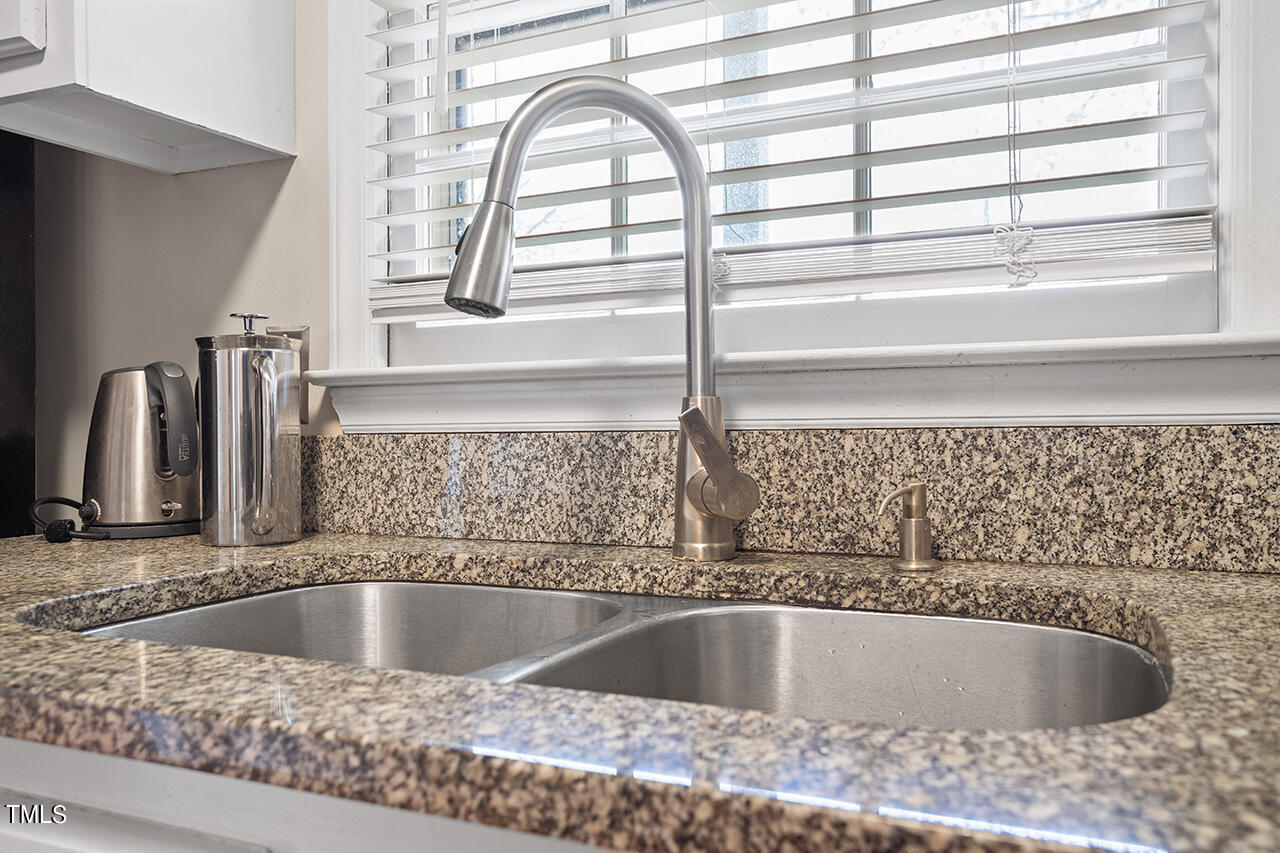 107 Long Shadow Place Durham, NC 27713 - Photo 11 of 31 a view closed with a granite countertop sink