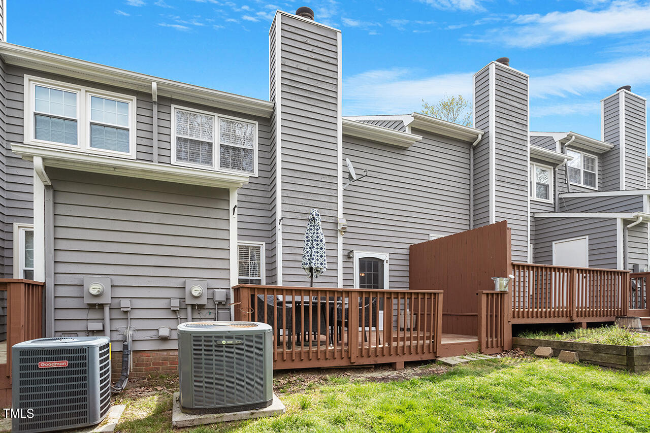 107 Long Shadow Place Durham, NC 27713 - Photo 27 of 31 a view of backyard with deck and outdoor seating
