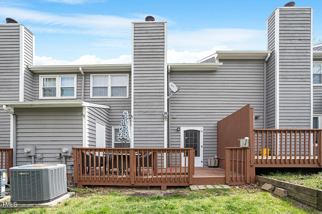 107 Long Shadow Place Durham, NC 27713 - Photo 28 of 31 a view of a house with a yard and deck