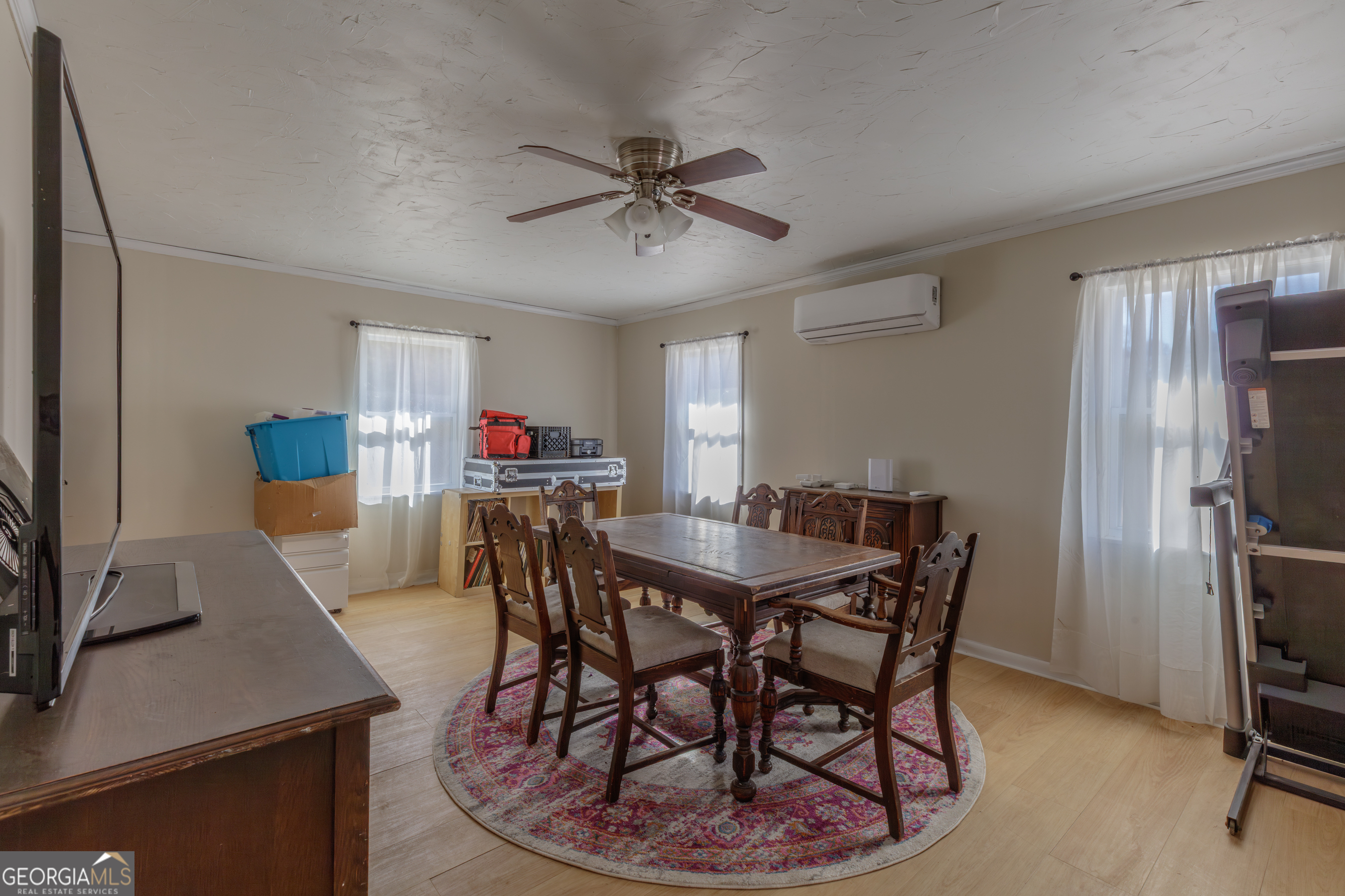 1144 Ridgeway Road LaFayette, GA 30728 - Photo 22 of 66 a view of a dining room with furniture and a chandelier