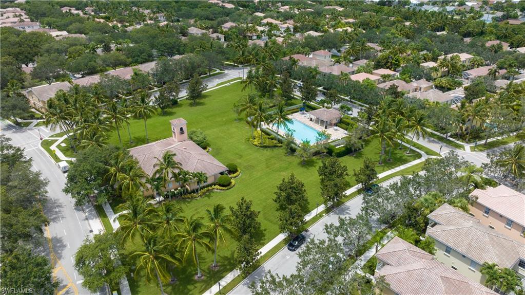 136 Florence Drive Jupiter, FL 33458 - Photo 15 of 23 an aerial view of a house with a yard and lake view