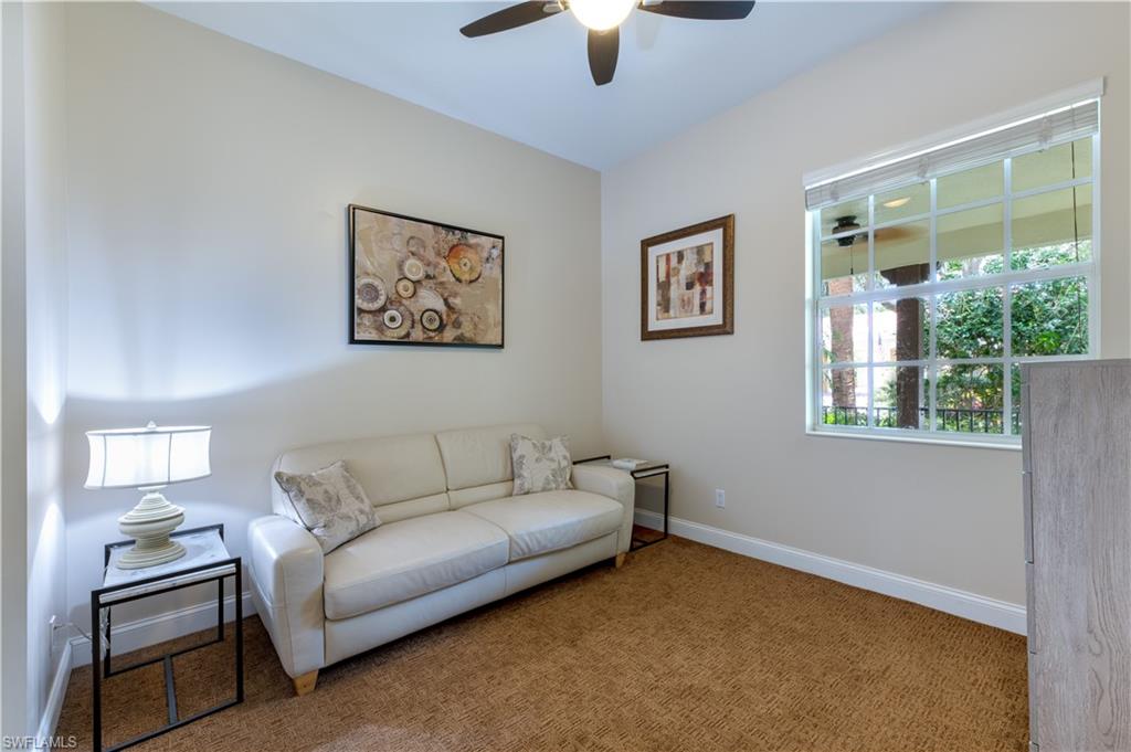 136 Florence Drive Jupiter, FL 33458 - Photo 16 of 23 a living room with furniture and a window