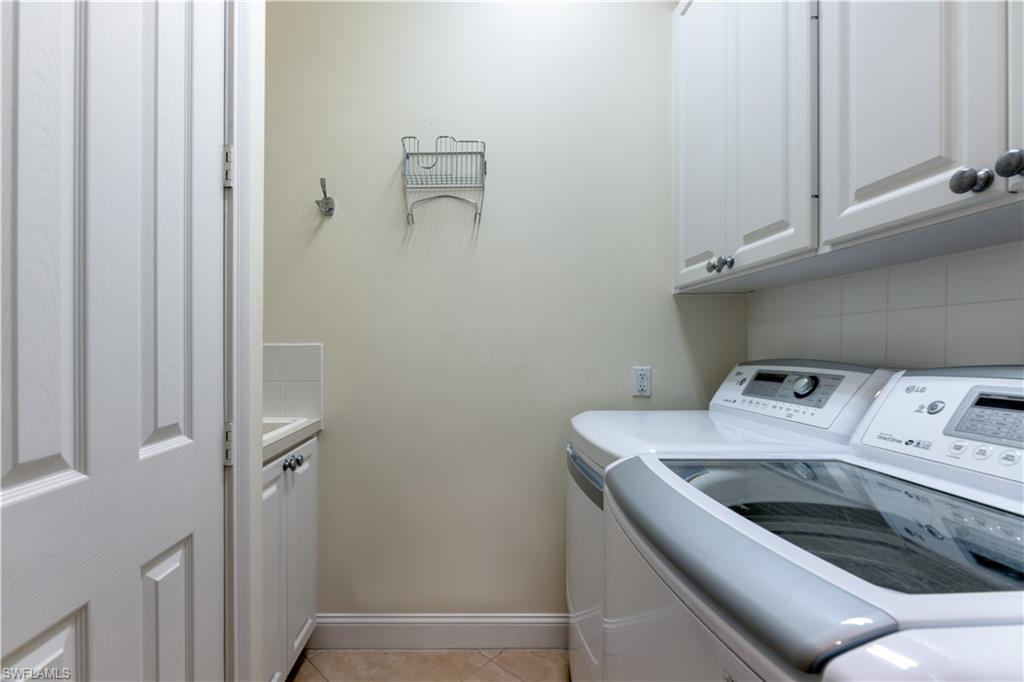136 Florence Drive Jupiter, FL 33458 - Photo 19 of 23 a utility room with dryer and washer