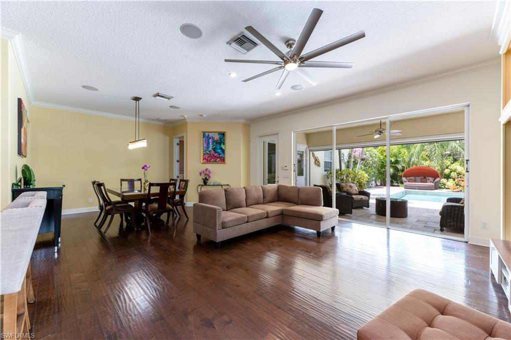 136 Florence Drive Jupiter, FL 33458 - Photo 23 of 23 a living room with furniture and a large window
