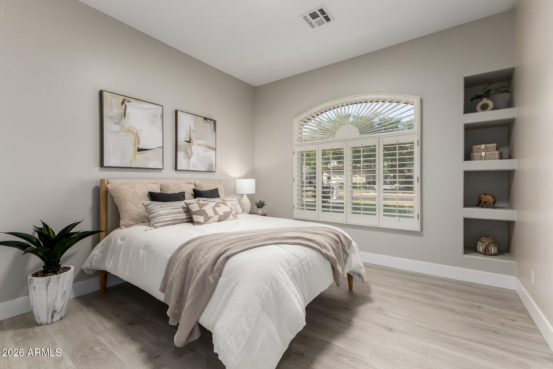 103 West Vista Avenue Phoenix, AZ 85021 - Photo 24 of 43 a spacious bedroom with a bed and a large window