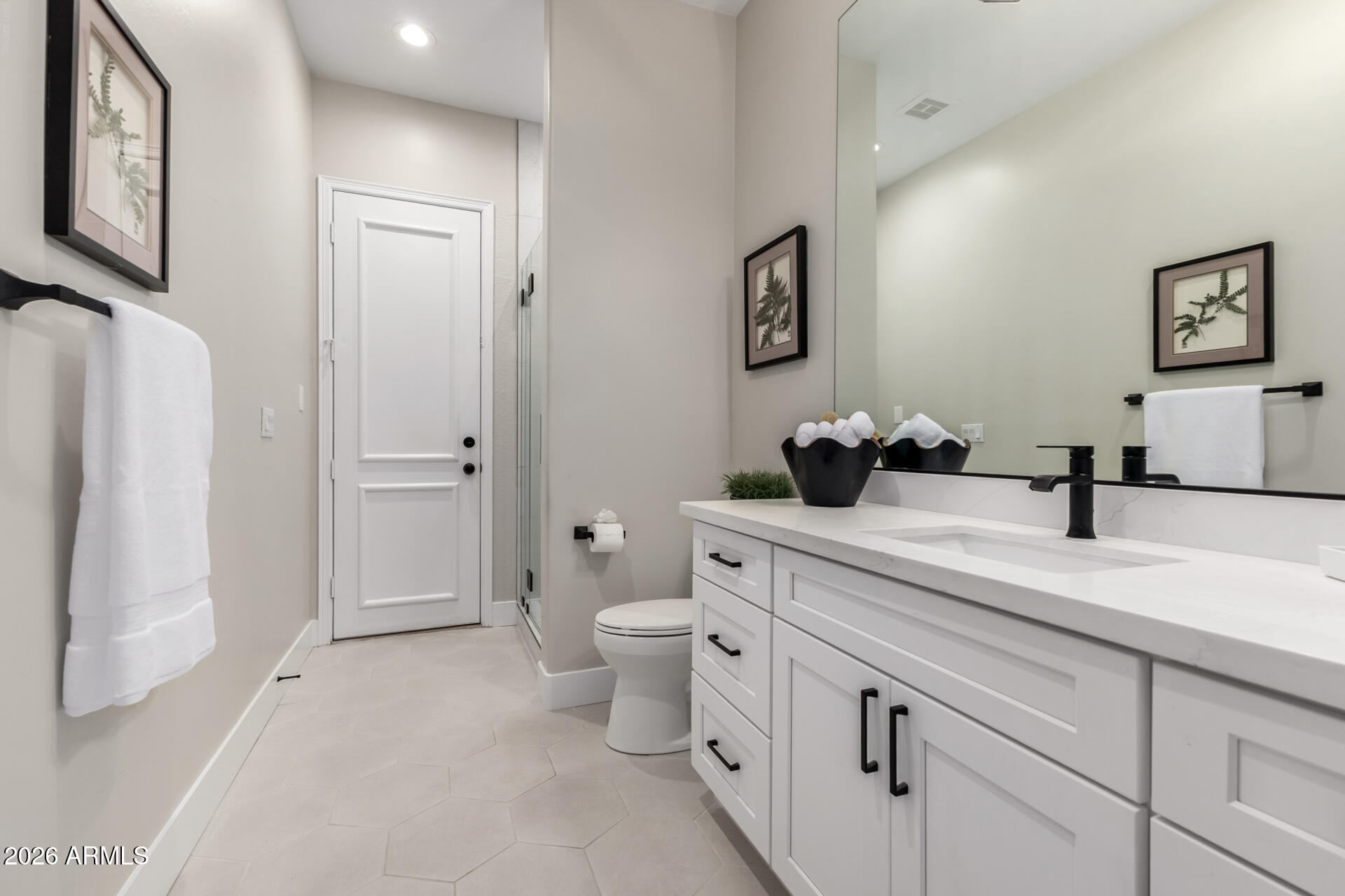103 West Vista Avenue Phoenix, AZ 85021 - Photo 28 of 43 a bathroom with a sink a toilet and a shower