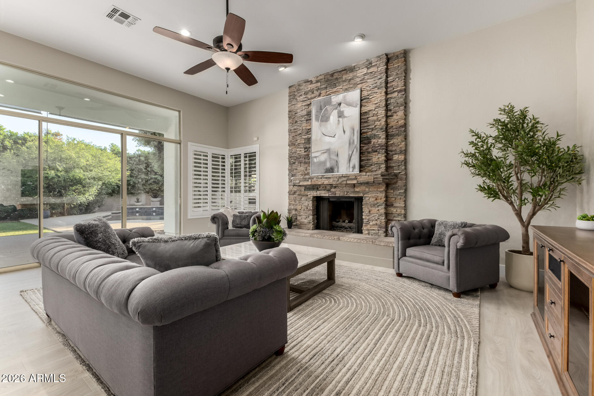 103 West Vista Avenue Phoenix, AZ 85021 - Photo 9 of 43 a living room with furniture fireplace and a large window
