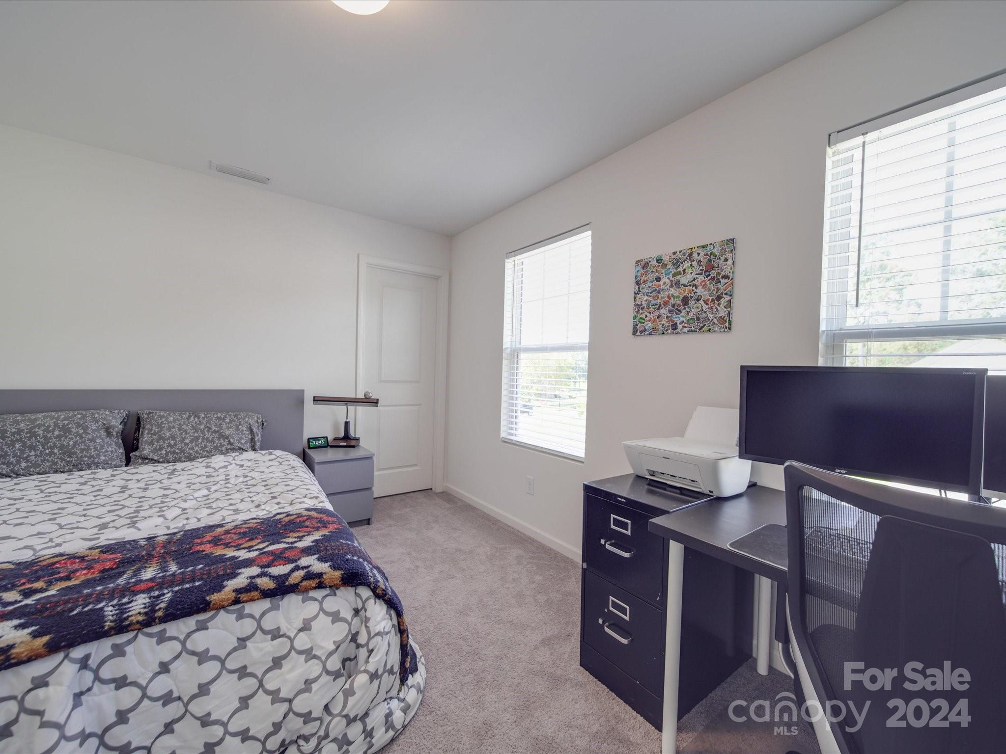 3824 Tersk Drive Midland, NC 28107 - Photo 28 of 39 a bedroom with a bed and a window
