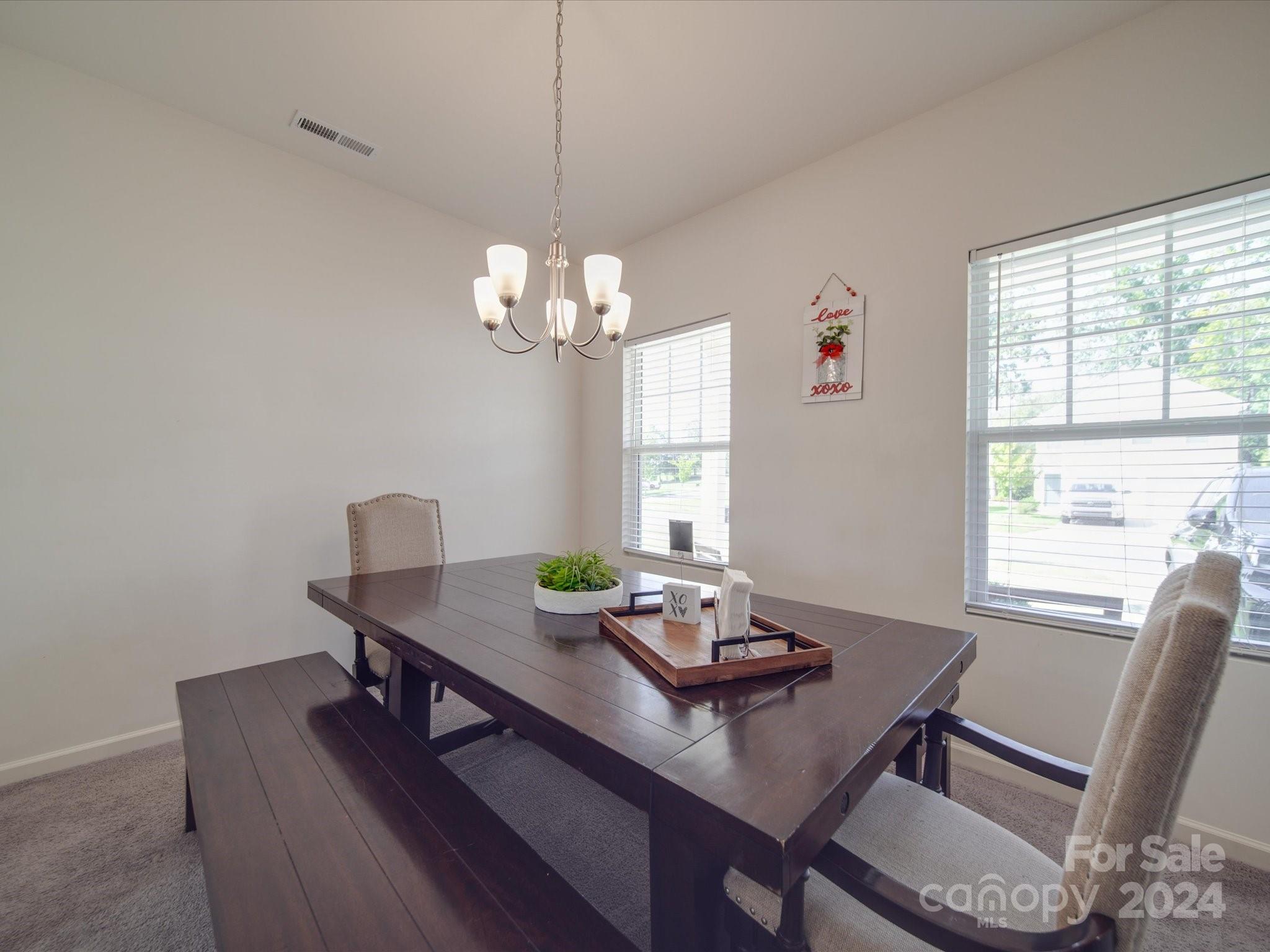 3824 Tersk Drive Midland, NC 28107 - Photo 3 of 39 a view of a dining room with furniture window and wooden floor