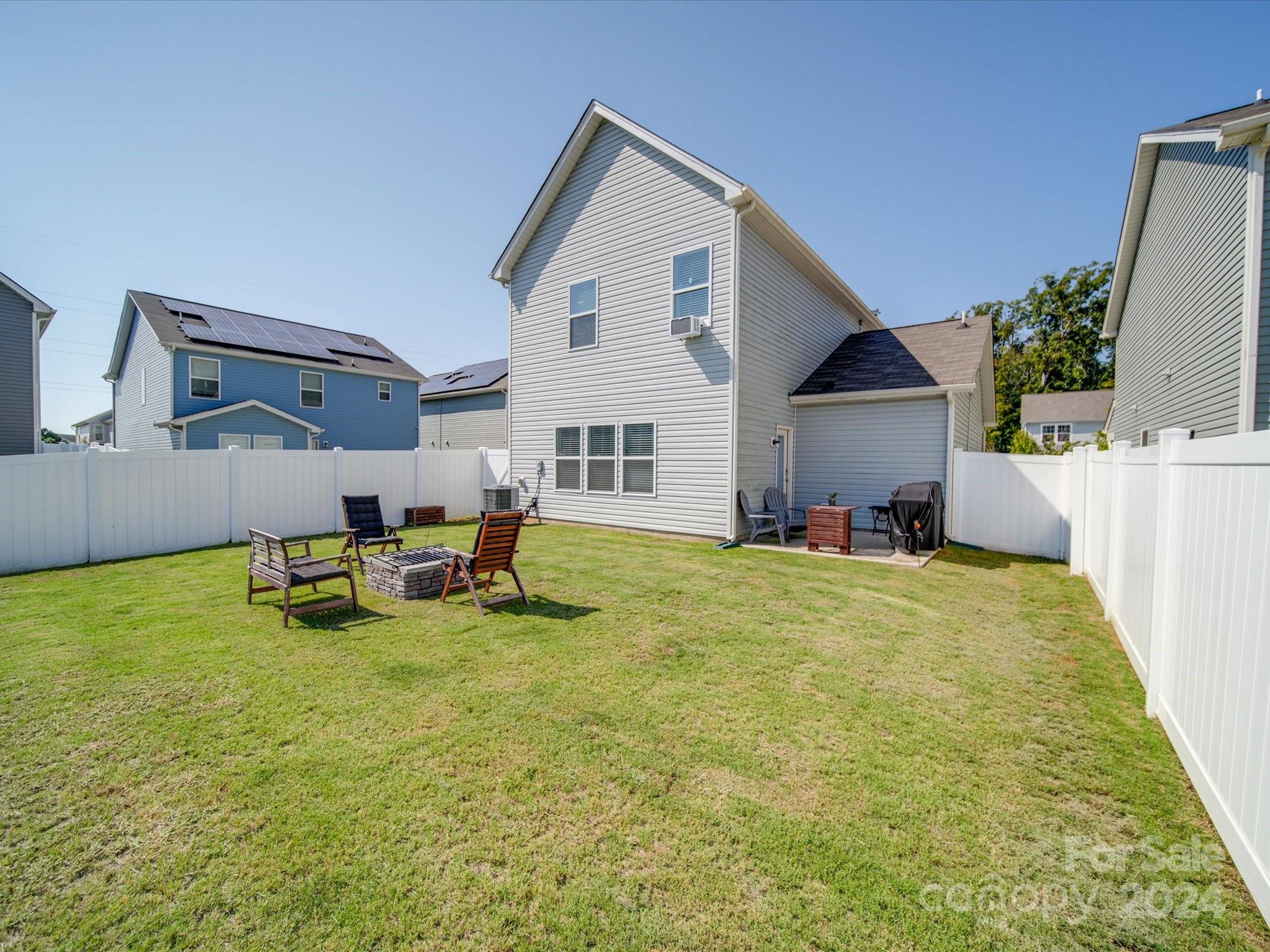 3824 Tersk Drive Midland, NC 28107 - Photo 36 of 39 a view of a house with backyard and sitting area