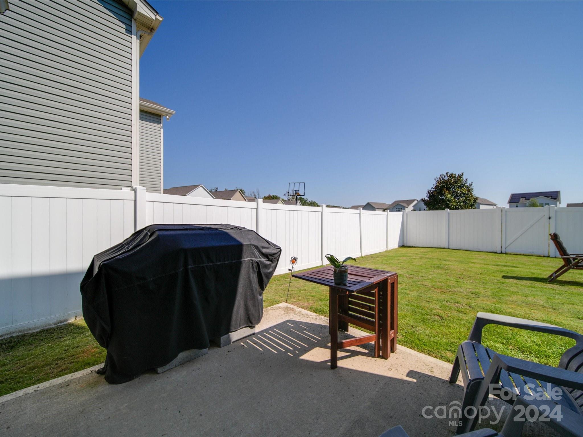 3824 Tersk Drive Midland, NC 28107 - Photo 37 of 39 a view of a swimming pool with a lounge chairs