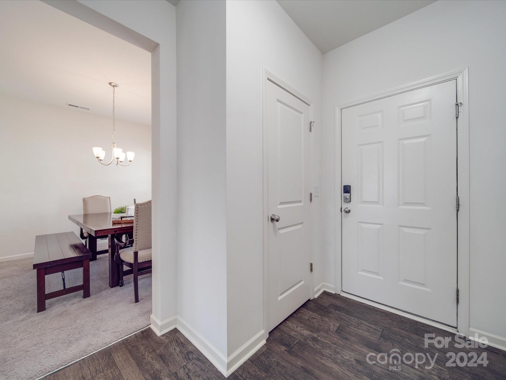 3824 Tersk Drive Midland, NC 28107 - Photo 5 of 39 a view of a room with wooden floor lounge chair and windows