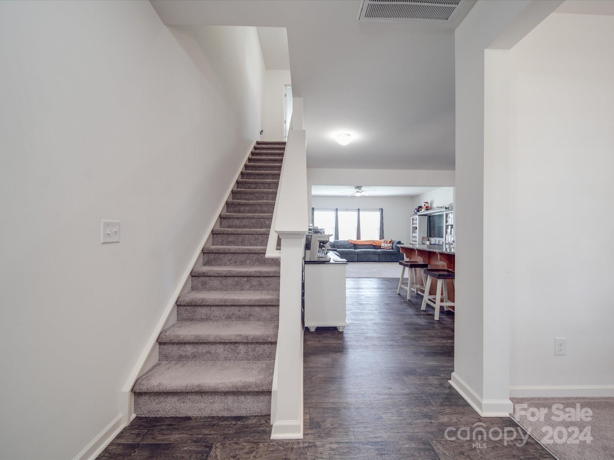 3824 Tersk Drive Midland, NC 28107 - Photo 6 of 39 a view of entryway and hall with wooden floor