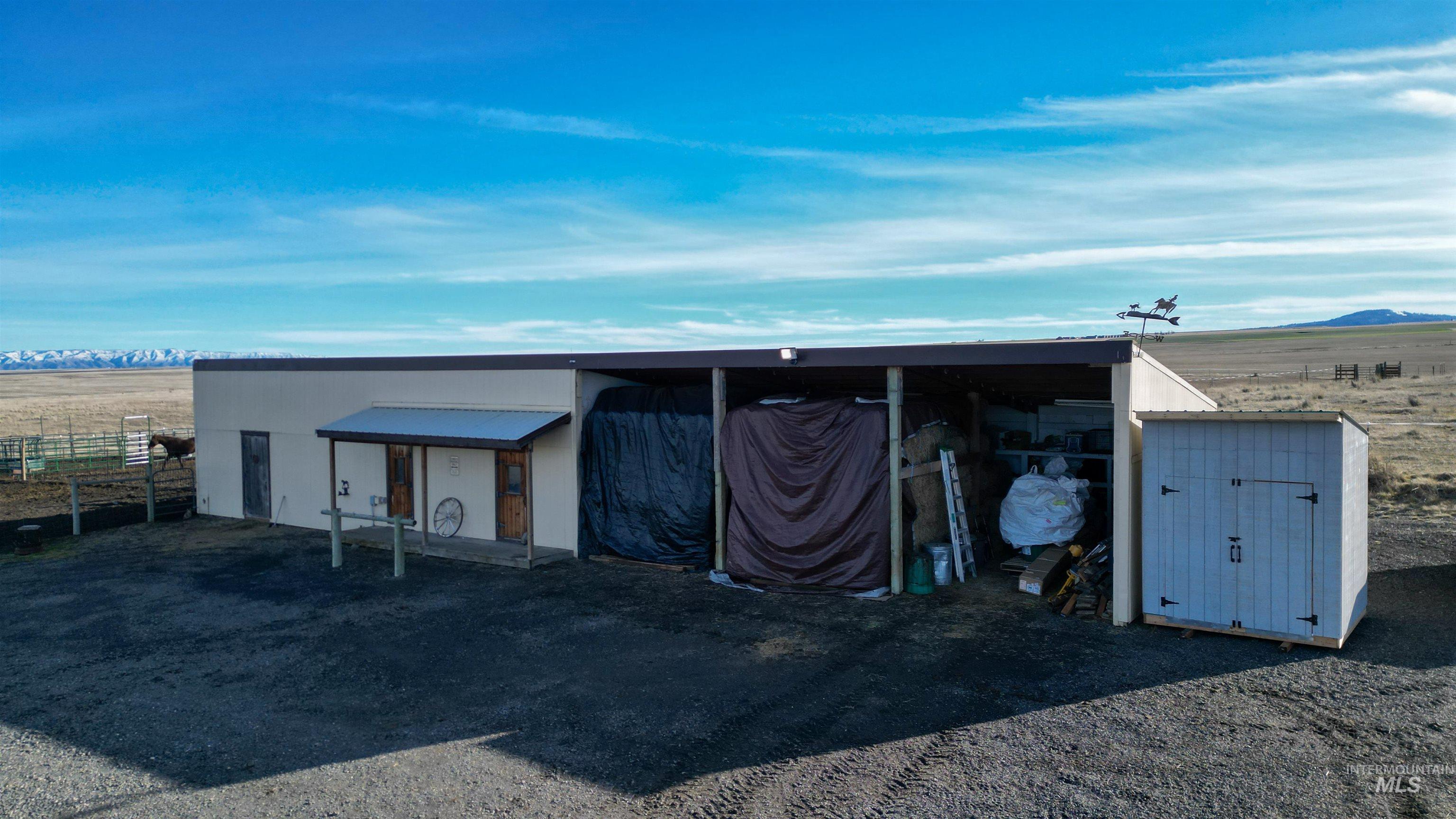 19397 Cloverland Road Asotin, WA 99402 - Photo 28 of 35 View of pole building featuring a view of countryside and a mountain view