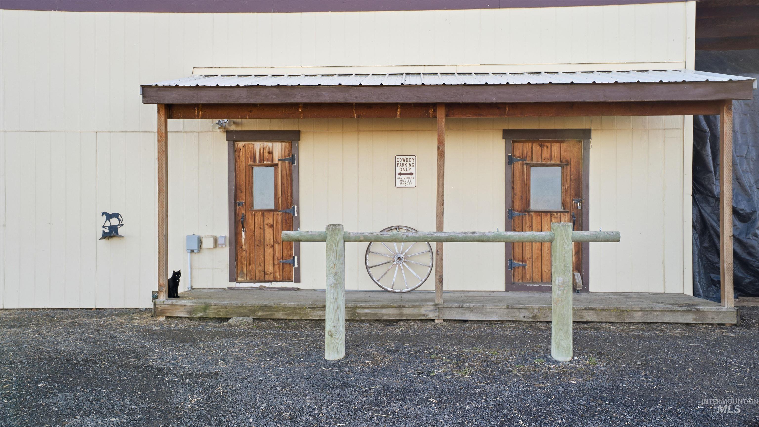 19397 Cloverland Road Asotin, WA 99402 - Photo 29 of 35 Entrance to property with a metal roof and a porch, 2 Bedrooms/storage rooms, full bath with W/D Hookups